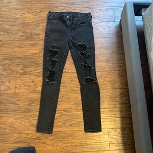 black ripped american eagle skinny jeans